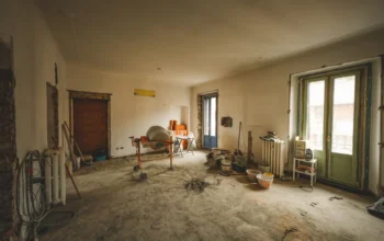 Room under renovation with tools ready for wall preparation