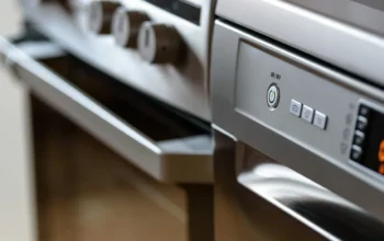 Stainless steel dishwasher and oven in a modern kitchen