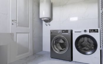Modern utility room with washing machine and tiled flooring
