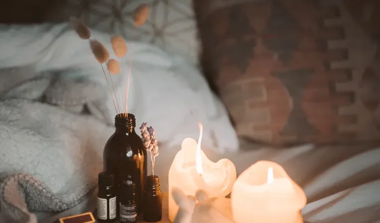 Lit candles in a cosy home setting