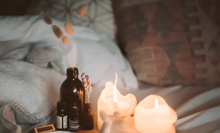 Lit candles in a cosy home setting