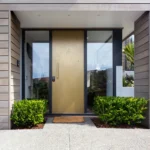 Modern house front entrance with composite front door