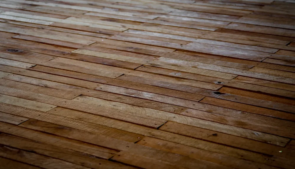 Staggered wooden floorboards showing natural texture