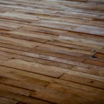 Staggered wooden floorboards showing natural texture