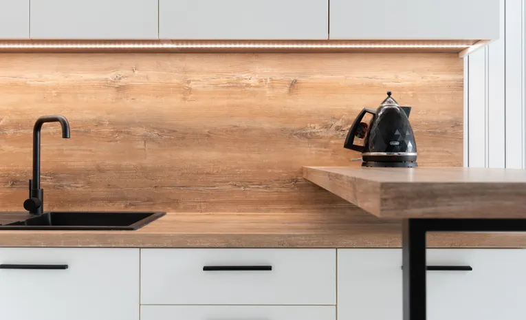 Kettle placed on a wooden kitchen counter