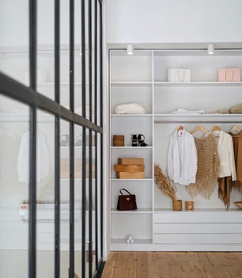 Modern wardrobe with organised shelves for bedroom storage