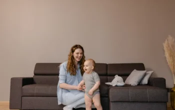 Parent and child in a childproofed living room