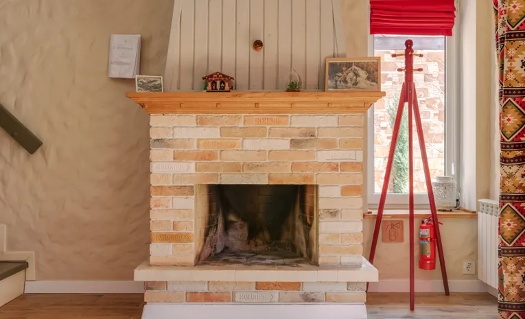How to Clean a Fireplace Surround by Material