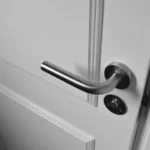 White wooden interior door slightly ajar