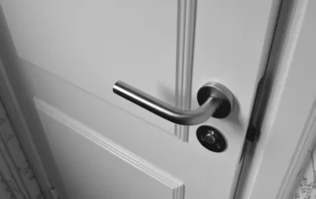 White wooden interior door slightly ajar