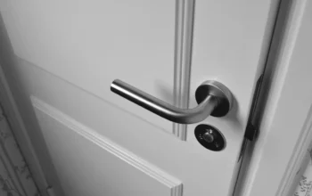 Interior wooden door with hinge and handle