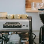 Espresso machine and grinder on a kitchen countertop