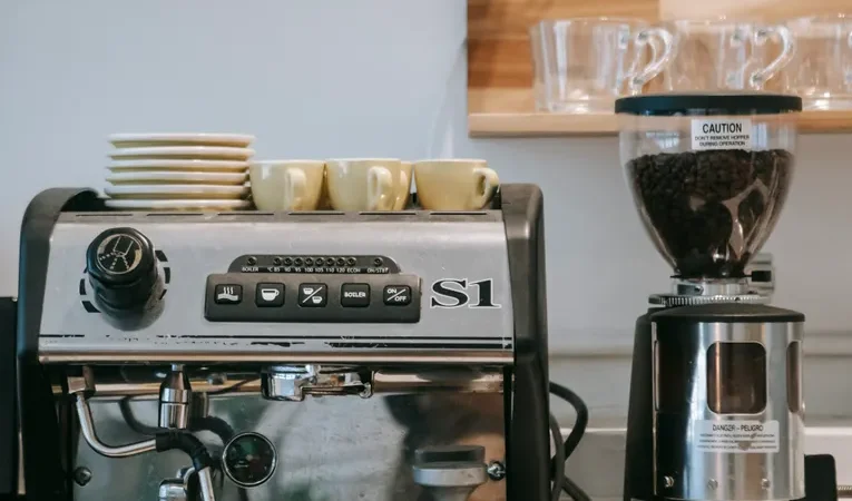 Espresso machine and grinder on a kitchen countertop