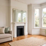 Staged living room in a UK terraced house with neutral colours and natural light